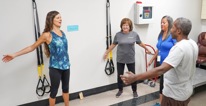 a group of coworkers attending a fitness class